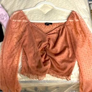 Large ambiance top, see thru sleeves and see thru back